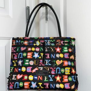 - Dooney & Bourke “Tassel Tote” Handbag